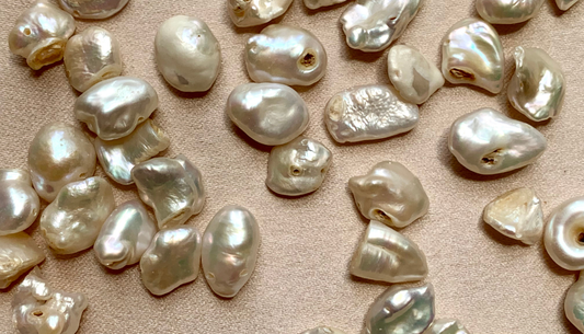 Why do modern women prefer irregular baroque pearls over traditional perfect spheres?