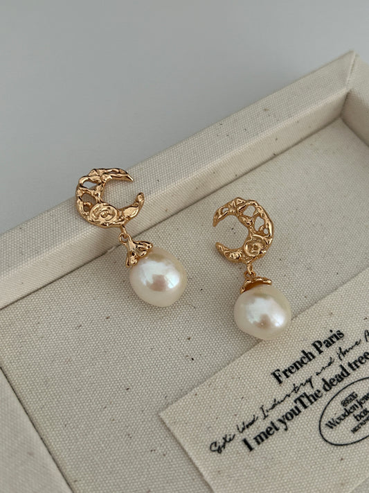 Gold-tone baroque hoop earrings with two dangling white pearls