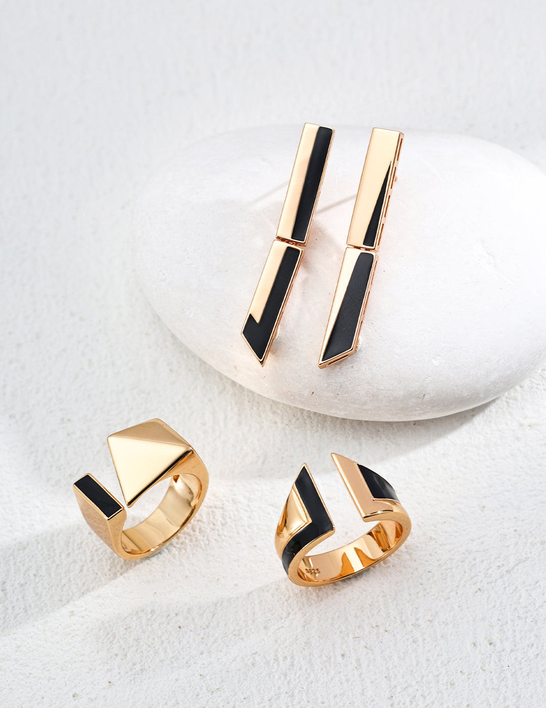 Gold-tone enamel ring with black rectangular insets